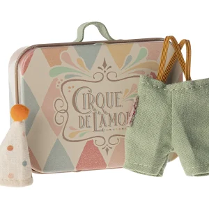 Ropa de payaso en maleta - hermano pequeño