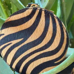 LLAVERO MONEDERO REDONDO CEBRA